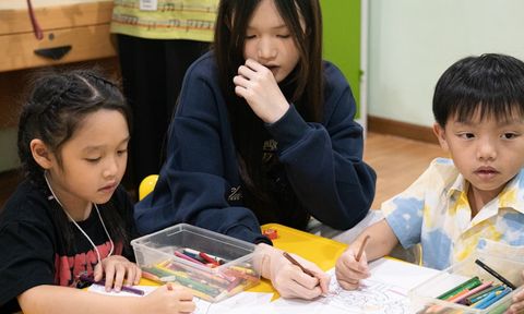 Child engaged in personalised learning activities at home