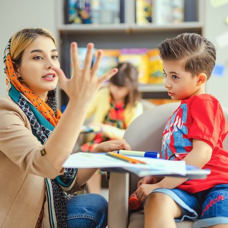 Child receiving speech and communication support at home